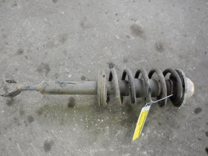 Front shock absorber rod, left from a Volkswagen Passat Variant (3B6) 2.5 TDI V6 24V 2001