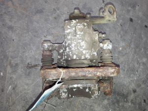 Used Rear brake calliper, left Renault Scénic I (JA) 1.4 16V Price on request offered by Autodemontage Joko B.V.