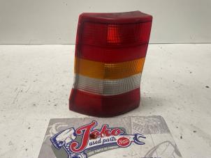Used Taillight, left Opel Astra F Caravan (51/52) 1.6i Price on request offered by Autodemontage Joko B.V.