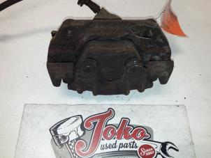 Used Front brake calliper, left BMW 5 serie (E34) 520i 24V Price on request offered by Autodemontage Joko B.V.