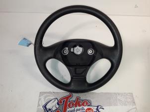 Used Steering wheel Citroen Saxo 1.1i X,SX Price on request offered by Autodemontage Joko B.V.