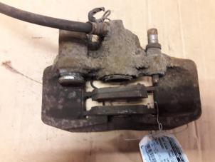Used Rear brake calliper, left Mercedes Vito (638.1/2) 2.2 CDI 108 16V Price on request offered by Autodemontage Joko B.V.