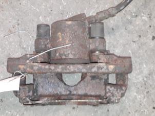 Used Front brake calliper, right Ford Fiesta 4 1.8 Diesel 93 EEC Price on request offered by Autodemontage Joko B.V.