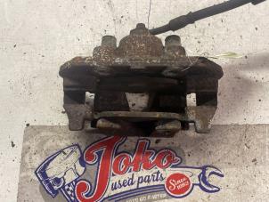 Used Front brake calliper, right Opel Corsa B (73/78/79) 1.0i 12V Price on request offered by Autodemontage Joko B.V.