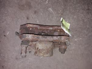 Used Front brake calliper, left Opel Frontera Wagon (MWL) 2.4i Price on request offered by Autodemontage Joko B.V.