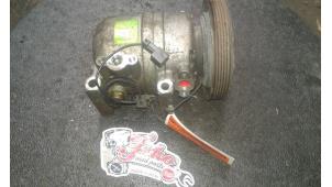 Used Air conditioning pump Nissan Primera (P10) 2.0i 16V SPi Kat. Price on request offered by Autodemontage Joko B.V.