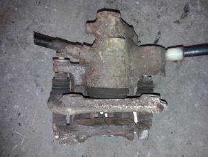 Used Rear brake calliper, left Ford Scorpio I (GNM) 2.9 CLXi,GLXi Price on request offered by Autodemontage Joko B.V.