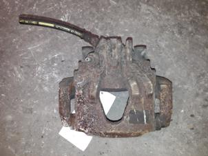 Used Front brake calliper, right Peugeot 306 (7A/C/S) 1.4 Price on request offered by Autodemontage Joko B.V.