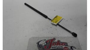 Used Bonnet gas strut, left Opel Astra H SW (L35) 1.3 CDTI 16V Ecotec Price on request offered by Autodemontage Joko B.V.