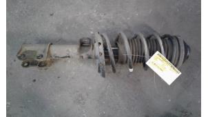 Used Front shock absorber rod, right Opel Astra H SW (L35) 1.3 CDTI 16V Ecotec Price on request offered by Autodemontage Joko B.V.