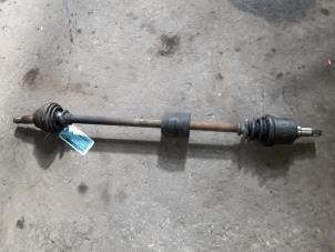Used Front drive shaft, right Ford Escort 6 (ANL) 1.6 Laser 16V Price on request offered by Autodemontage Joko B.V.