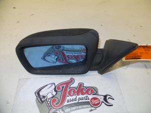 Used Wing mirror, left BMW 3 serie (E36/4) 325 td Price on request offered by Autodemontage Joko B.V.