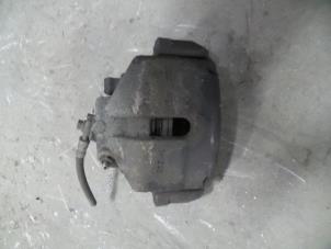 Used Front brake calliper, right Volkswagen Touran (1T1/T2) 1.9 TDI 105 Euro 3 Price on request offered by Autodemontage Joko B.V.
