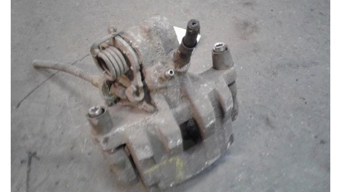 Rear brake calliper, left from a Ford Transit Connect 1.8 TDCi 90 2010