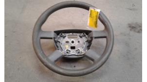 Used Steering wheel Ford Transit Connect 1.8 TDCi 90 DPF Price on request offered by Autodemontage Joko B.V.