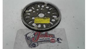 Used Flywheel Nissan Micra (K12) 1.2 16V Price on request offered by Autodemontage Joko B.V.