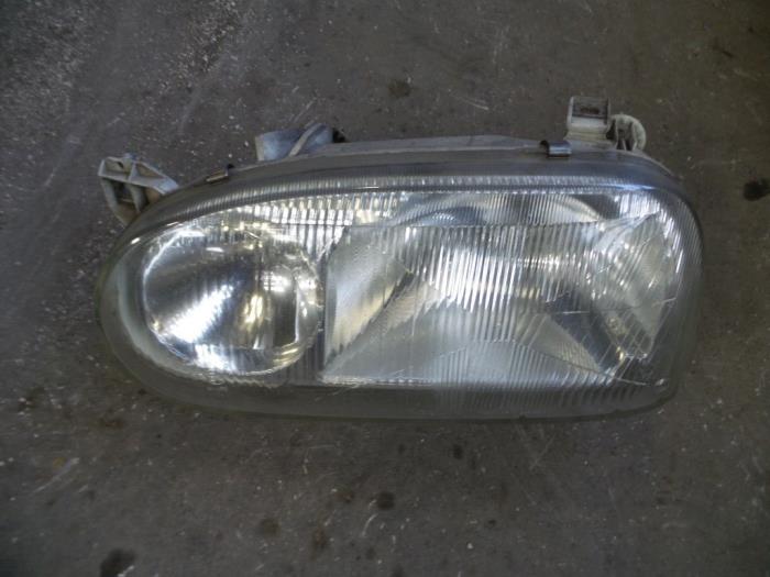 Headlight, left from a Volkswagen Golf 1995