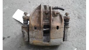 Used Front brake calliper, left Volvo V40 (VW) 2.0 16V Price on request offered by Autodemontage Joko B.V.