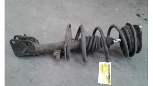 Used Front shock absorber rod, left Renault Laguna II Grandtour (KG) 1.9 dCi 120 Price on request offered by Autodemontage Joko B.V.