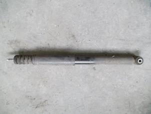 Used Rear shock absorber, left Renault Clio III (BR/CR) 1.6 16V Price on request offered by Autodemontage Joko B.V.