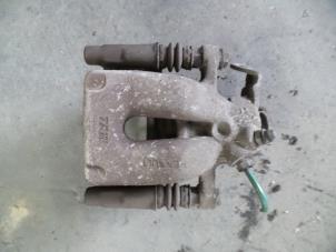 Used Rear brake calliper, left Renault Clio III (BR/CR) 1.6 16V Price on request offered by Autodemontage Joko B.V.