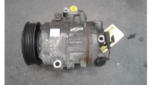 Used Air conditioning pump Volkswagen Polo IV (9N1/2/3) 1.4 16V Price on request offered by Autodemontage Joko B.V.