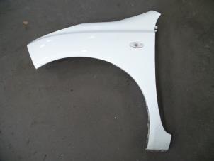 Used Front wing, left Nissan Micra (K12) 1.2 16V Price on request offered by Autodemontage Joko B.V.