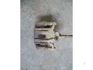 Used Rear brake calliper, left Nissan Pathfinder (R51) 2.5 dCi 16V 4x4 Price on request offered by Autodemontage Joko B.V.