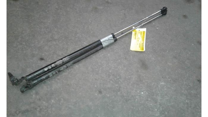 Rear gas strut, left from a Toyota Starlet (EP8/NP8) 1.3 Friend,XLi 12V 1994