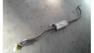 Used Exhaust middle silencer Opel Corsa D 1.4 16V Twinport Price on request offered by Autodemontage Joko B.V.