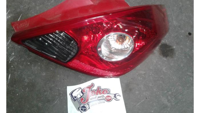 Taillight, right from a Opel Corsa D 1.4 16V Twinport 2010