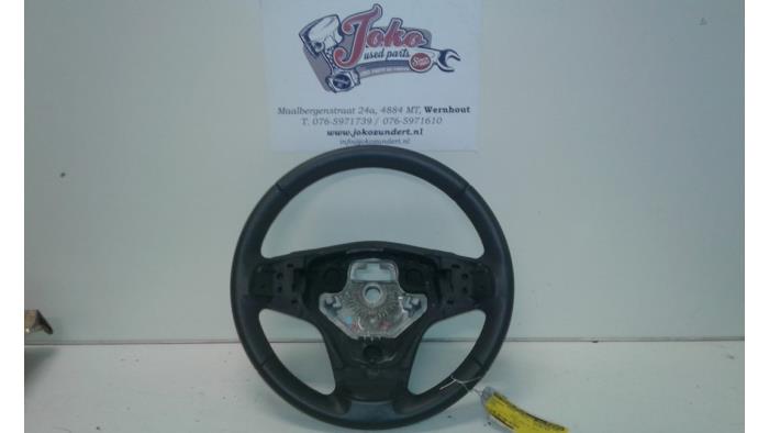 Steering wheel from a Opel Corsa D 1.4 16V Twinport 2010