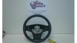 Used Steering wheel Opel Corsa D 1.4 16V Twinport Price on request offered by Autodemontage Joko B.V.