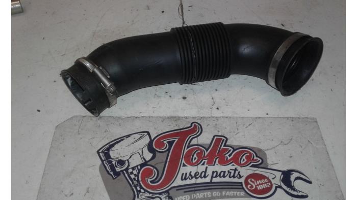 Air intake hose from a Opel Corsa D 1.4 16V Twinport 2010