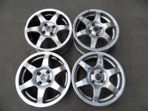 Used Set of sports wheels Mazda MX-3 1.6i 16V Price on request offered by Autodemontage Joko B.V.