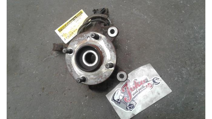 Knuckle, front right from a Ford Fiesta 6 (JA8) 1.4 TDCi 2009