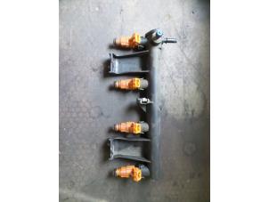 Used Injector (petrol injection) Peugeot 206 (2A/C/H/J/S) 1.6 16V Price on request offered by Autodemontage Joko B.V.