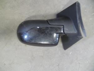 Used Mirror housing, left Renault Twingo II (CN) 1.2 16V Price on request offered by Autodemontage Joko B.V.