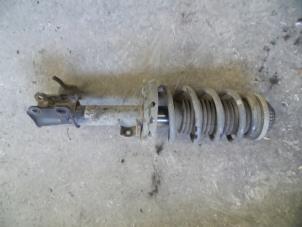 Used Front shock absorber rod, left Opel Astra H GTC (L08) 1.3 CDTI 16V Ecotec Price on request offered by Autodemontage Joko B.V.
