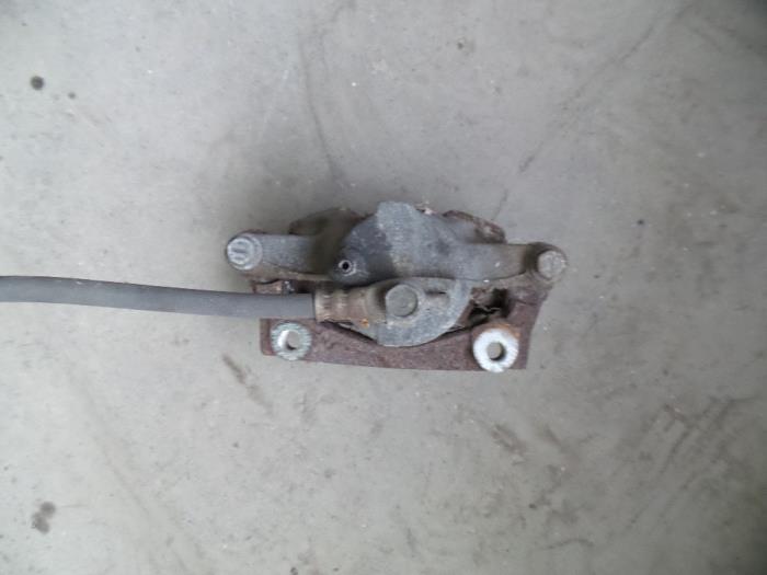 Front brake calliper, left from a Peugeot 107 1.0 12V 2011