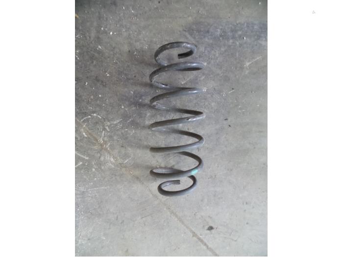 Rear coil spring from a Peugeot 107 1.0 12V 2011