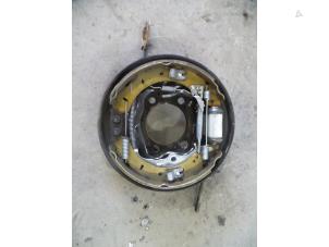 Used Brake anchor plate Ford Focus 3 1.6 Ti-VCT 16V 125 Price on request offered by Autodemontage Joko B.V.