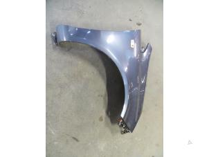 Used Front wing, right Opel Corsa D 1.3 CDTi 16V ecoFLEX Price on request offered by Autodemontage Joko B.V.