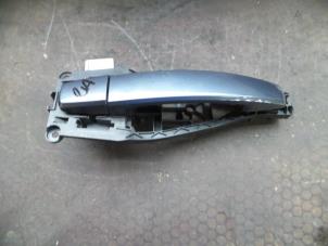Used Rear door handle 4-door, right Opel Corsa D 1.3 CDTi 16V ecoFLEX Price on request offered by Autodemontage Joko B.V.