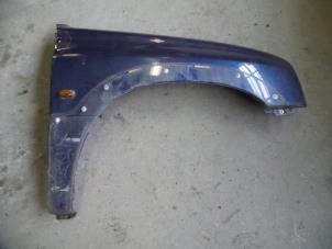 Used Front wing, right Suzuki Grand Vitara I (FT/GT/HT) 1.6 16V Price on request offered by Autodemontage Joko B.V.