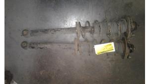 Used Rear shock absorber rod, left Mitsubishi Colt Price on request offered by Autodemontage Joko B.V.
