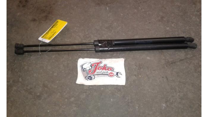 Rear gas strut, left from a Ford S-Max (GBW) 2.0 TDCi 16V 140 2010