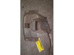 Used Front brake calliper, left Ford S-Max (GBW) 2.0 TDCi 16V 140 Price on request offered by Autodemontage Joko B.V.