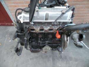 Used Engine Mitsubishi Colt (CJ) 1.3 16V Price on request offered by Autodemontage Joko B.V.