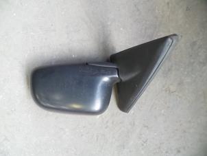 Used Wing mirror, left Mitsubishi Colt (CJ) 1.3 16V Price on request offered by Autodemontage Joko B.V.
